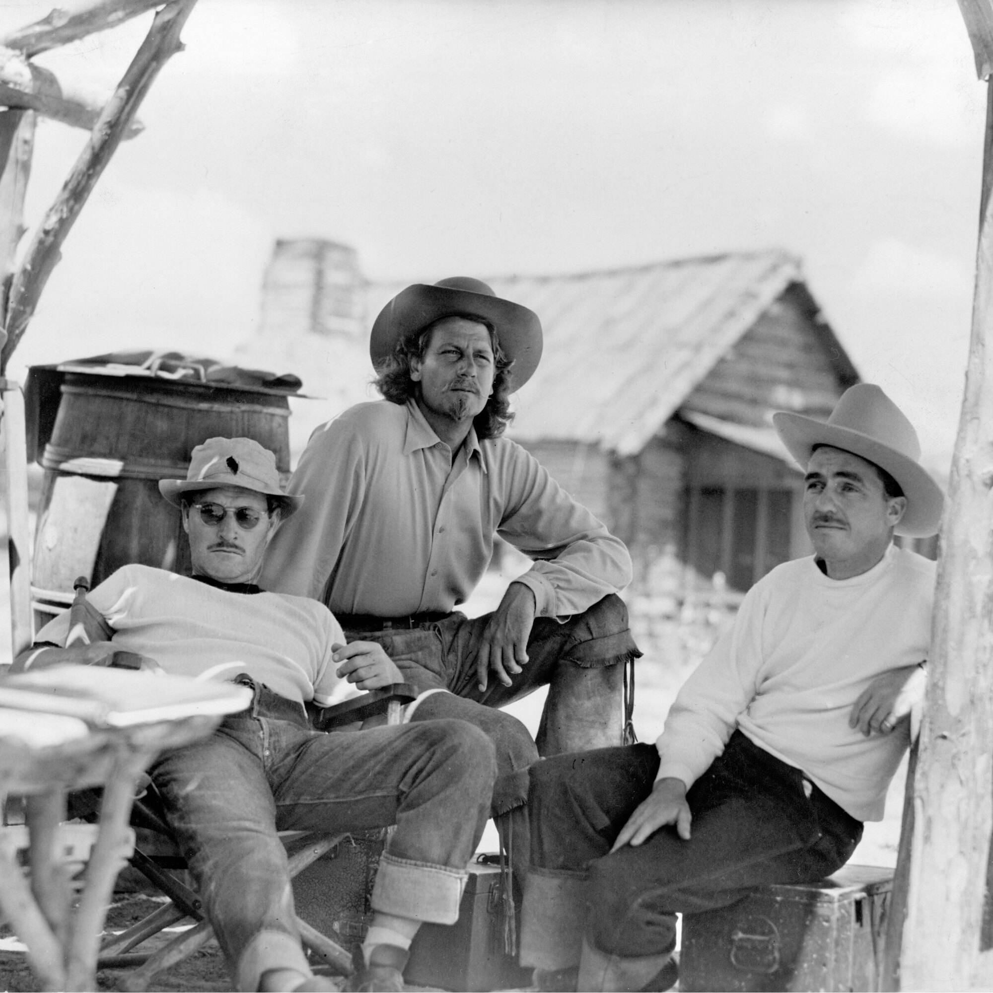 William Wellman, Joel McRea, and editor James B. Clark on the set of Buffalo Bill. 1944. USA. Directed by William A. Wellman. © Twentieth Century Fox