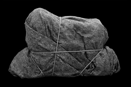 Henrik Olesen. Imitation/Enigma (2). 2008. Box, adhesive tape, rope, padding material, and blanket, 23 5/8 x 39 3/8 x 11 13/16&#34; (60 x 100 x 30 cm). © Henrik Olesen. Courtesy the artist and Galerie Daniel Buchholz, Cologne and Berlin