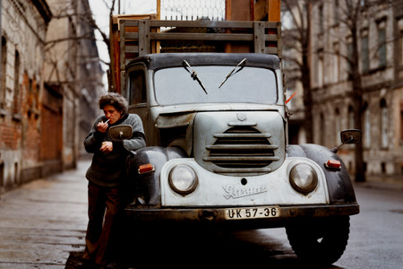 Eberhard Grames (German, b. 1953). Man with His Truck, East Germany. 1990. Chromogenic color print, 15 3/4 × 19 3/4ʺ (40 × 50.2 cm). Horace W. Goldsmith Fund through Robert B. Menschel. © 2016 Ebergard Grames