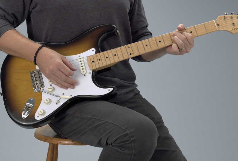 Leo Fender, George Fullerton, Freddie Tavares. Fender Stratocaster Electric Guitar. Designed 1954, this example 1957. Wood, metal, and plastic. Committee on Architecture and Design Funds