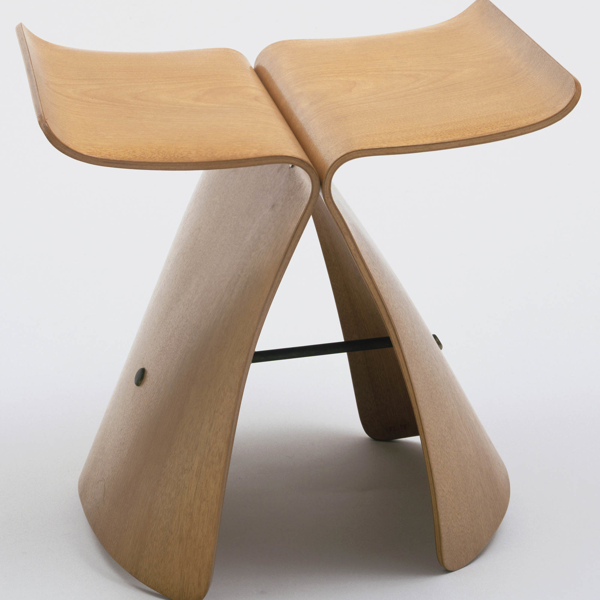 Sori Yanagi. Butterfly Stool. 1956. Molded plywood and metal, 15½ × 17⅜ × 12⅛" (39.4 × 44.1 × 30.8 cm). Manufactured by Tendo Co., Ltd., Tokyo. The Museum of Modern Art, New York. Gift of the designer, 1958