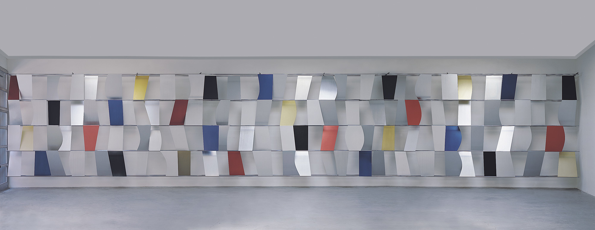 Ellsworth Kelly. Sculpture for a Large Wall (detail). 1957. Anodized aluminum, 104 panels. 11' 5" x 65' 5" x 28" (348 x 1994 x 71.1 cm). Gift of Jo Carole and Ronald S. Lauder. © 2012 Ellsworth Kelly