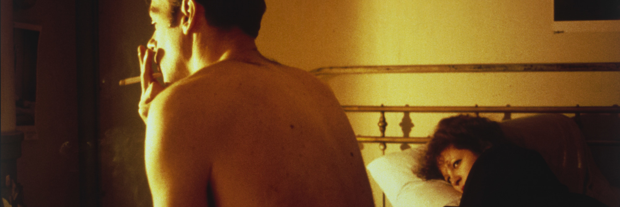 Nan Goldin (American, born 1953). Nan and Brian in Bed, New York City. 1983. Silver dye bleach print, printed 2006, 15 1/2 × 23 3/16&#34; (39.4 × 58.9 cm). The Museum of Modern Art, New York. Acquired through the generosity of Jon L. Stryker. © 2016 Nan Goldin