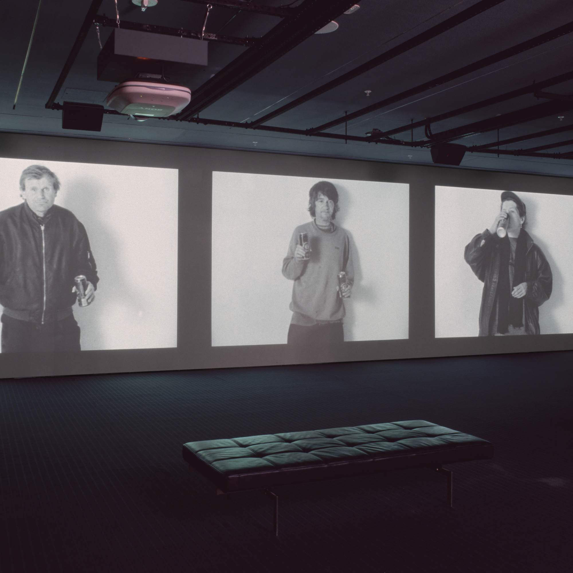 Gillian Wearing. Drunk. 1997–1999. Three-channel video (black and white, sound), 28:35 min. Dimensions variable; approximately 13′ × 37′ × 22' (396.2 × 1127.8 × 670.6 cm). Gift of Nina and Gordon Bunshaft, The Ken and Judith Joy Family Foundation, Barbara Foshay, and Margot P. Ernst. © 2016 Gillian Wearing