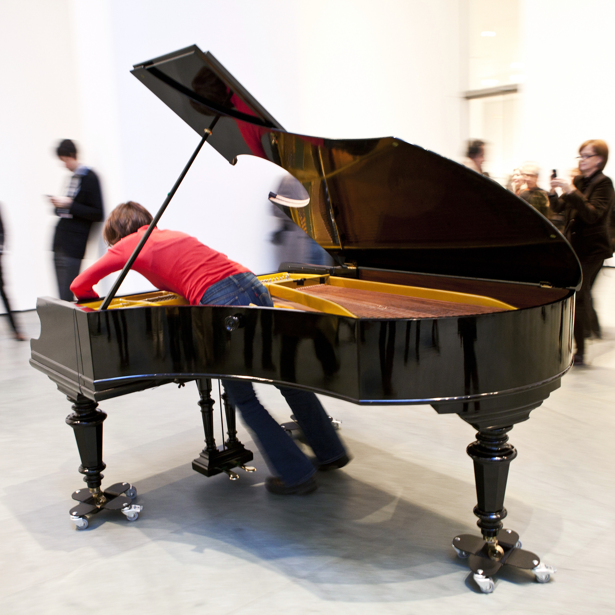 Jennifer Allora and Guillermo Calzadilla. Stop, Repair, Prepare: Variations on “Ode to Joy” for a Prepared Piano. 2008. Prepared Bechstein piano, pianist (Terezija Cukrov shown). Piano: 40 x 67 x 84" (101.6 x 170.2 x 213.4 cm). The Museum of Modern Art. Gift of the Julia Stoschek Foundation, Düsseldorf. © 2011 Yi-Chun Wu/The Museum of Modern Art