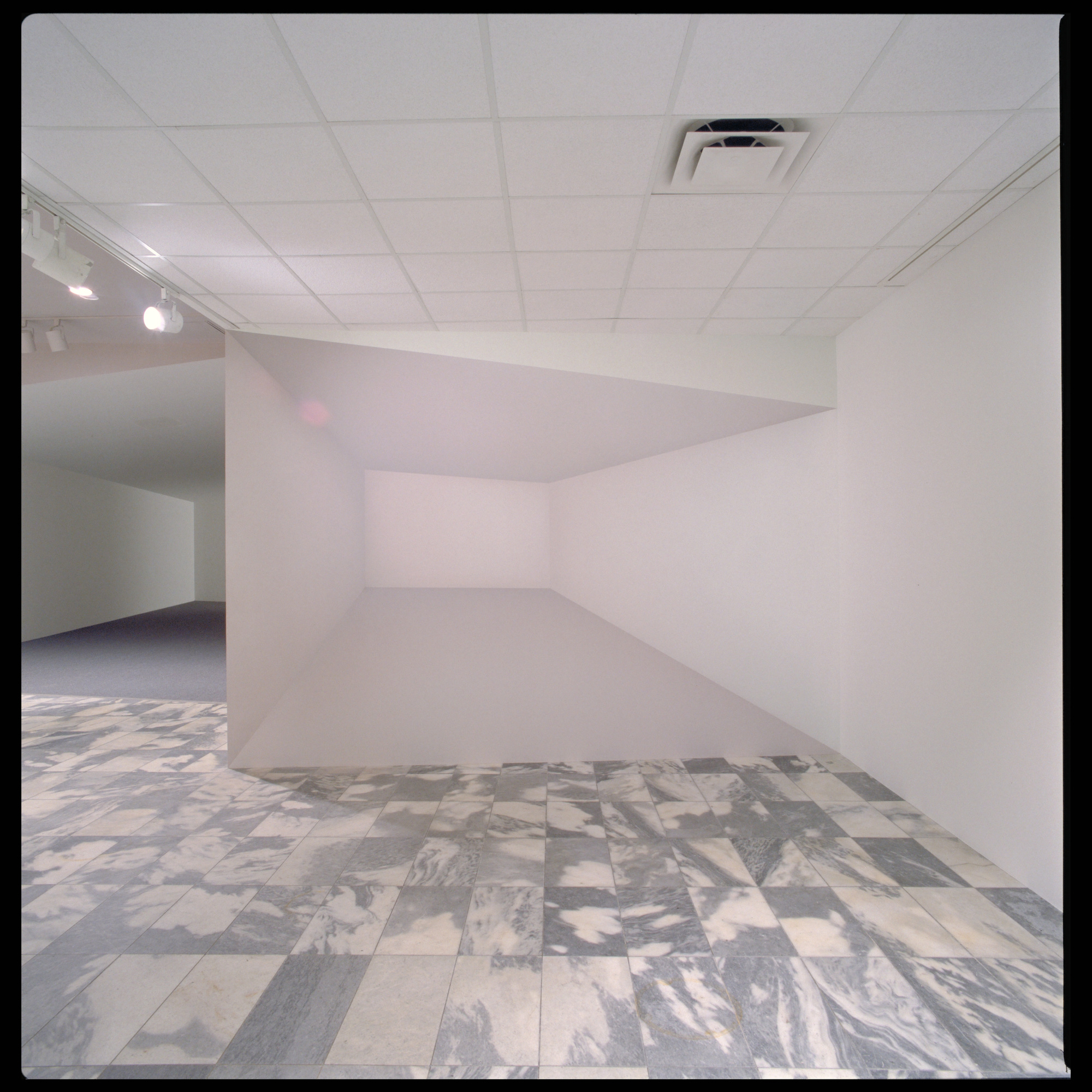 Ricci Albenda. Tesseract. 2001. Installation view. Wallboard, gatorboard, fiberglass, aluminum, paint, and light, 25 × 30 × 10′ (762 × 914.4 × 304.8 cm) (approx.). Courtesy Andrew Kreps Gallery, New York