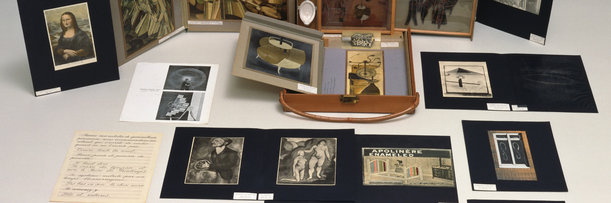 Marcel Duchamp. Box in a Valise (From or by Marcel Duchamp or Rrose Sélavy). 1935–41. Leather valise containing miniature replicas, photographs, color reproductions of works by Duchamp, and one “original” drawing [Large Glass, collotype on celluloid, 7 1/2 × 9 1/2″ (19 × 23.5 cm)]; 16 × 15 × 4″ (40.7 × 38.1 × 10.2 cm). James Thrall Soby Fund. © 2016 Artists Rights Society (ARS), New York / ADAGP, Paris / Estate of Marcel Duchamp