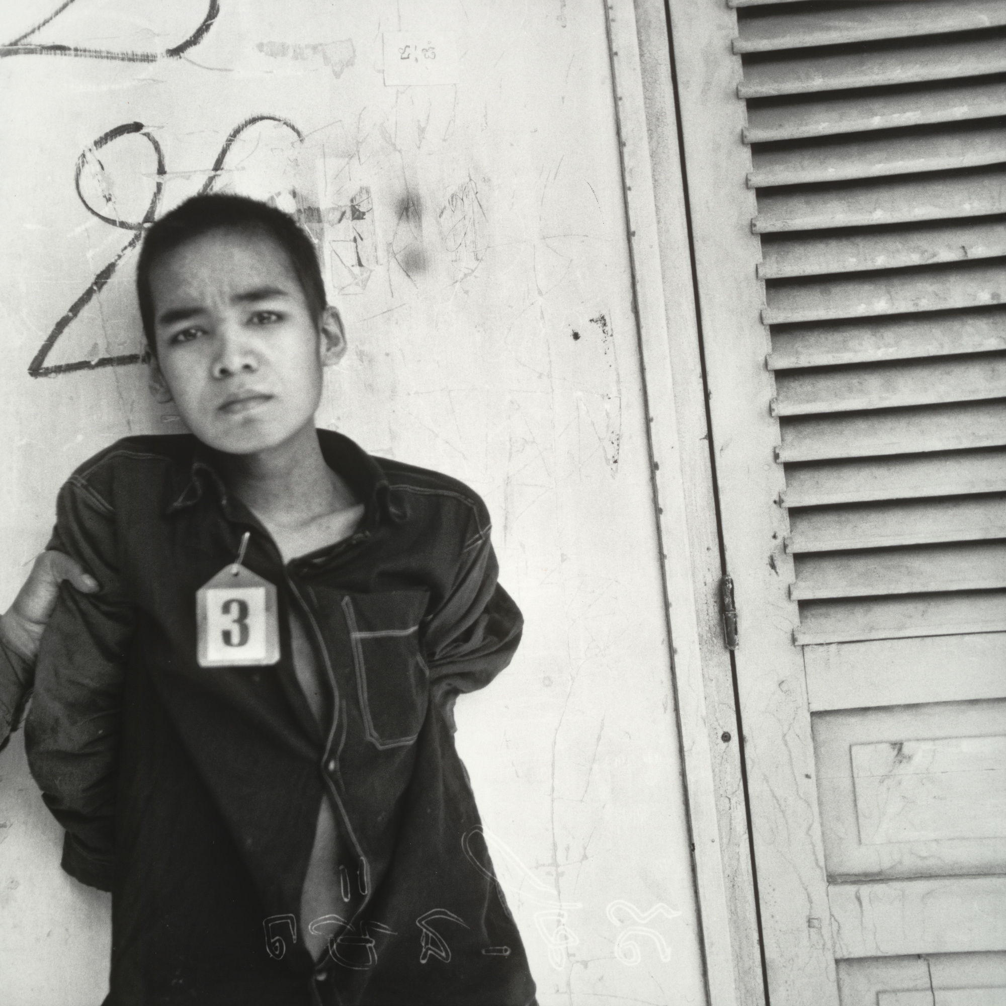 Nhem Ein. Untitled (prisoner #3 of the Khmer Rouge). 1975–79. Gelatin-silver print, reprinted by The Photo Archive Group, 1994. 14 × 11″. The Arthur M. Bullowa Fund and Geraldine Murphy Fund. © 1997 The Photo Archive Group