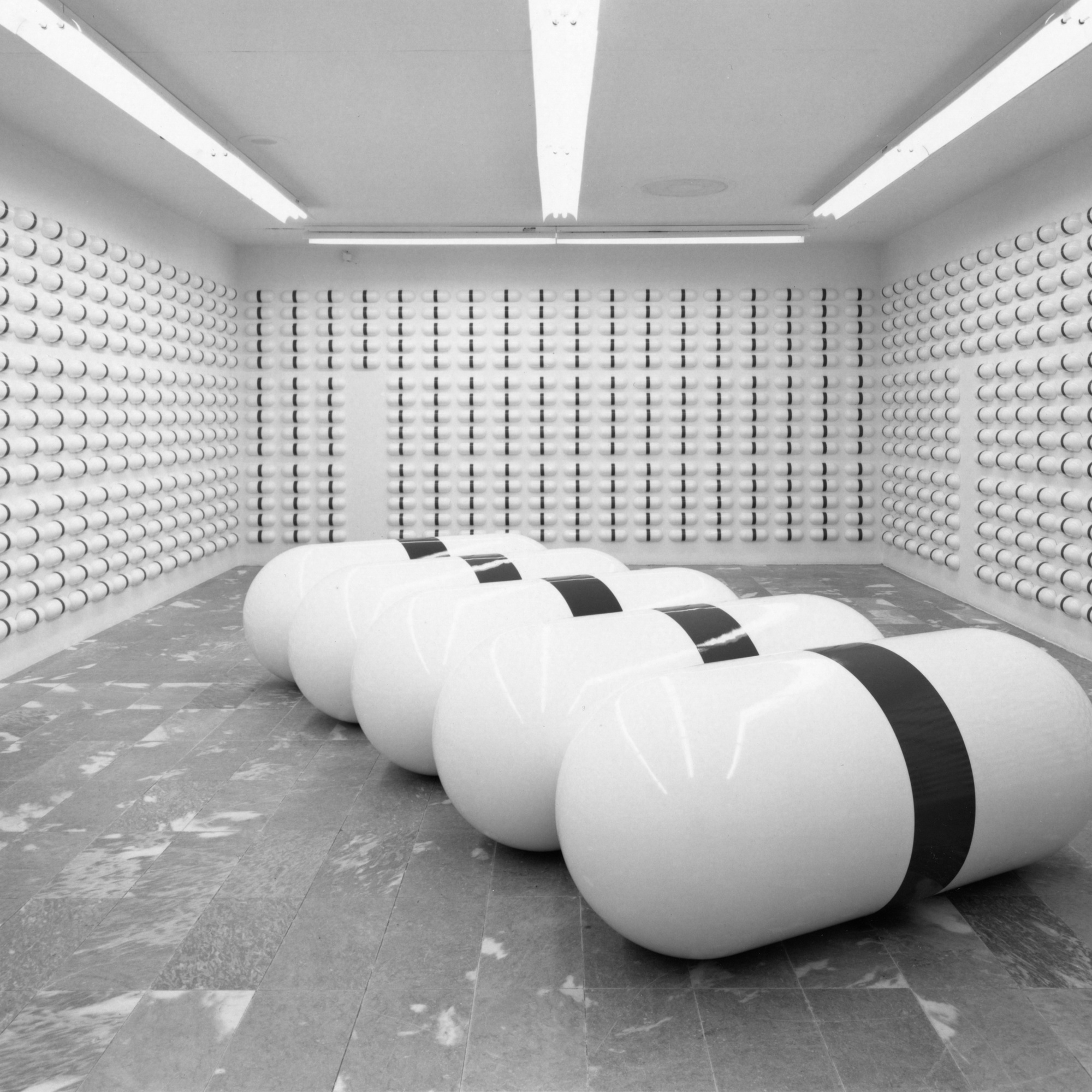 General Idea. One Day of AZT and One Year of AZT. 1991. Five units of fiberglass, each 33 7/16″ × 84 1/8 × 33 7/16″; 1,825 units of vacuum-formed polystyrene with vinyl, each 4 7/8 × 12 3/8 × 3″. Collection National Gallery of Canada, Ottawa. Installation view at The Museum of Modern Art, New York. Photo: Erik Landsberg