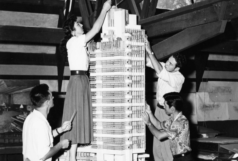 Frank Lloyd Wright. H. C. Price Company Tower, Bartlesville, OK. 1952–56. Apprentices working on the model in the Taliesin drafting room, Spring Green, Winsconsin, c. 1952. The Frank Lloyd Wright Foundation Archives (The Museum of Modern Art | Avery Architectural & Fine Arts Library, Columbia University, New York)