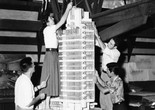 Frank Lloyd Wright. H. C. Price Company Tower, Bartlesville, OK. 1952–56. Apprentices working on the model in the Taliesin drafting room, Spring Green, Winsconsin, c. 1952. The Frank Lloyd Wright Foundation Archives (The Museum of Modern Art | Avery Architectural &amp; Fine Arts Library, Columbia University, New York)
