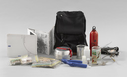 Rirkrit Tiravanija. Untitled (Rucksack Installation). 1993. Multiple of backpack, map, camping stove, dishes, can opener, and ingredients for a Thai rice meal rucksack (approx.): 15 3/4 x 12 5/8 x 11 7/16" (40 x 32 x 29cm); sheet (map): 76 5/16 x 68 1/8" (193.9 x 173 cm). The Museum of Modern Art. Purchased with funds given by Linda Barth Goldstein.