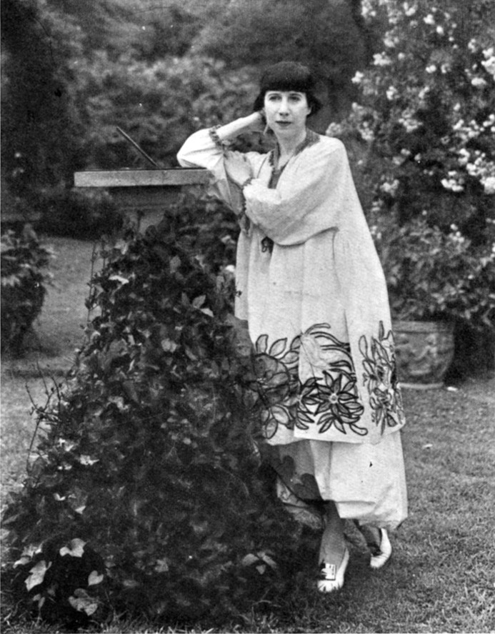 Florine Stettheimer, American artist, in her Bryant Park garden c.1917-1920.