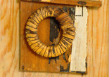 Kurt Schwitters. Untitled (Picture with Basket Ring). 1938. Wood, rattan ring, paper, iron, and steel nails on wood. 15 × 11 3/4″ (38.1 × 29.8 cm). The Riklis Collection of McCrory Corporation. © 2021 Artists Rights Society (ARS), New York/VG Bild‑Kunst, Bonn