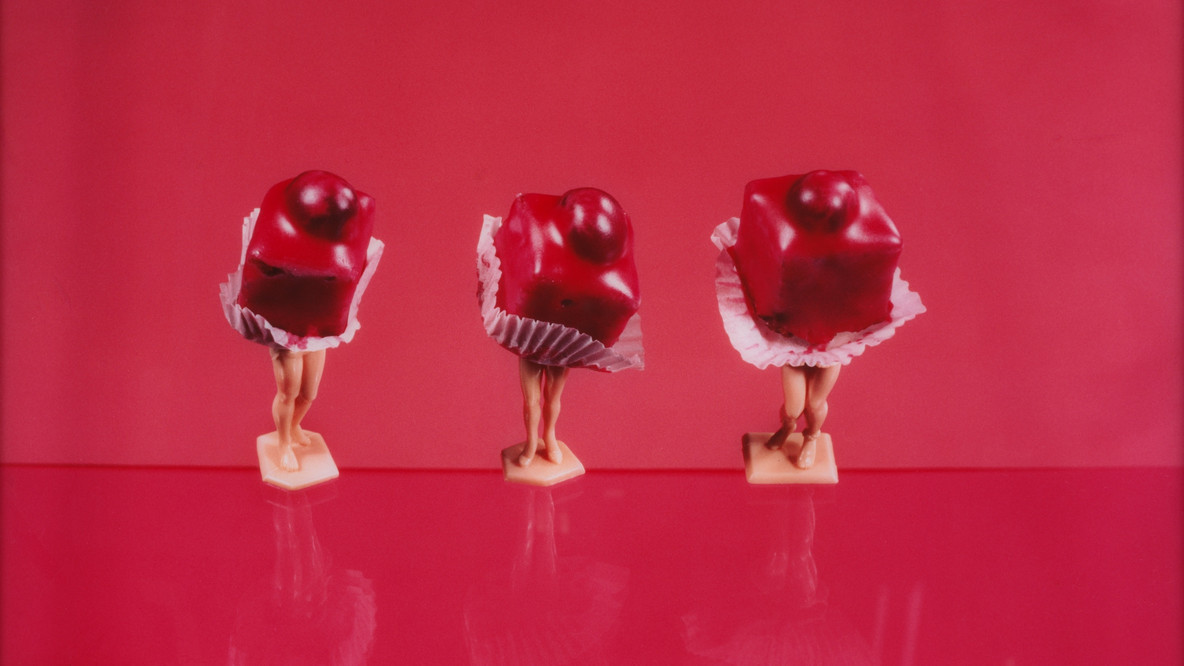 Laurie Simmons. Three Red Petit-Fours. 1990. Chromogenic print, 23 × 35&#34; (58.4 × 88.9 cm). Gift of Helen Kornblum in honor of Roxana Marcoci