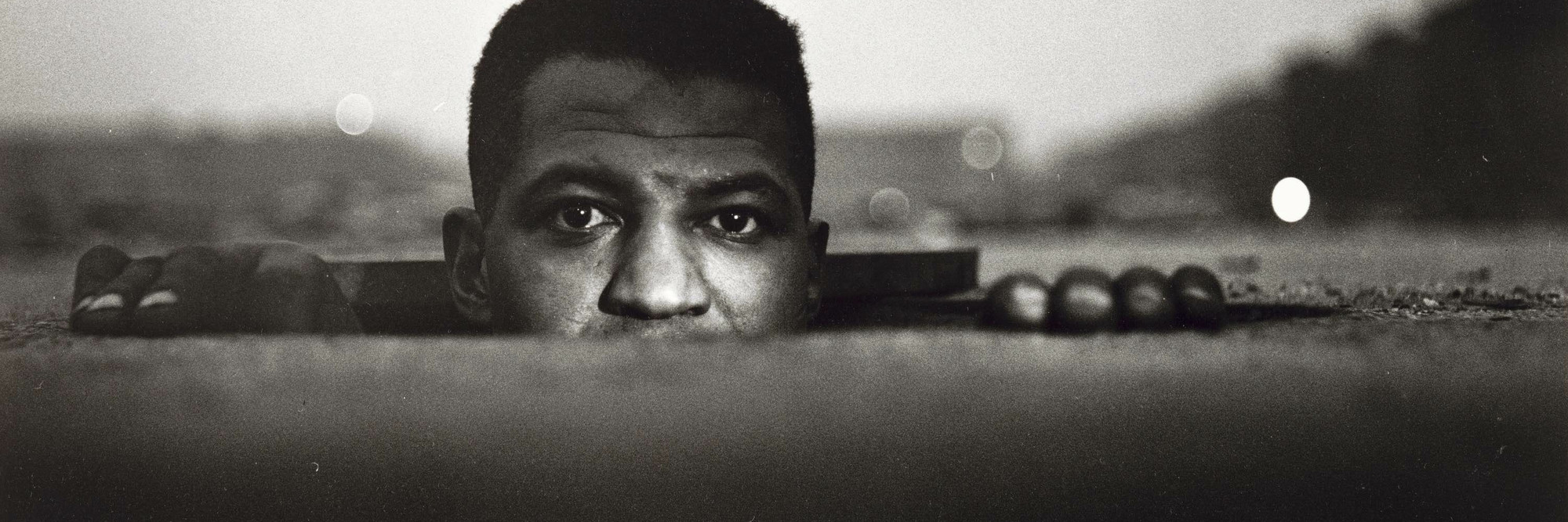 Gordon Parks. Emerging Man, Harlem, New York. 1952. Gelatin silver print, 8 7/16 x 12 7/8&#34; (21.4 x 32.7 cm). Acquired through the generosity of The Friends of Education of The Museum of Modern Art and Committee on Photography Fund. © 2017 Gordon Parks Foundation