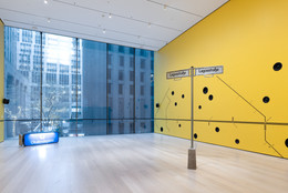 Emeka Ogboh. Lagos State of Mind III. 2017/2020. Eighteen-channel sound installation (35:25 min.), painted wall, galvanized steel and aluminum street sign, U-Bahn metro sign, concrete slab, and vinyl wall graphic. Fund for the Twenty-First Century. © 2022 Emeka Ogboh