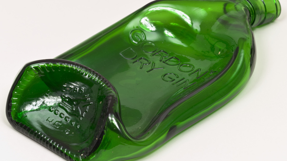 Gilbert &amp; George. Reclining Drunk. 1973. Glass bottle, other (irreg.): 9 5/16 × 4 15/16 × 1 3/4&#34; (23.7 × 12.5 × 4.5 cm). Printer: Art for All, London. Artist’s proof before the edition of 200. The Museum of Modern Art, New York. Art &amp; Project/Depot VBVR Gift. © 2023 Gilbert &amp; George