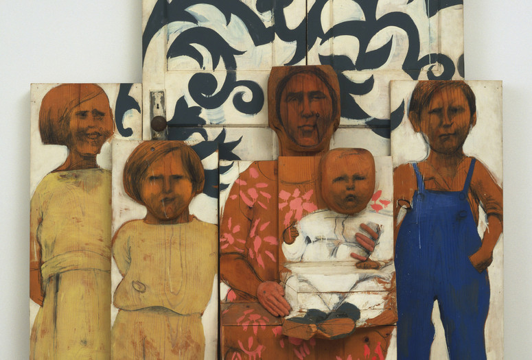 Marisol (Marisol Escobar). The Family. 1962. Paint and graphite on wood, sneakers, tinted plaster, door knob and plate, three sections. The Museum of Modern Art, New York. Advisory Committee Fund. © 2023 Marisol