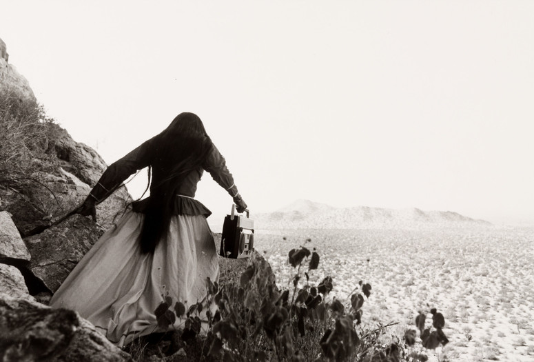 Graciela Iturbide. Mujer ángel, Desierto de Sonora (Angel Woman, Sonoran Desert). 1979. Gelatin silver print, printed 1986. The Museum of Modern Art, New York. Purchase. © 2023 Graciela Iturbide