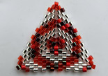 Photo: Beaded triangle. Image courtesy the artist