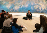 Tours for Fours: Where Are We? Places in Art. Photo: Manuel Martagon Image description: Families talk about nature at a Family Gallery Talk event