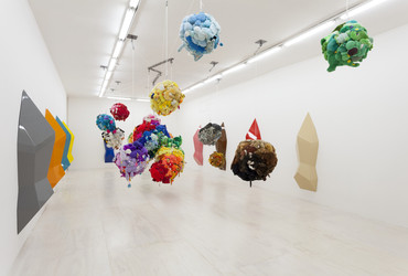 Mike Kelley. Deodorized Central Mass with Satellites. 1991/1999. Plush toys sewn over wood and wire frames with styrofoam packing material, nylon rope, pulleys, steel hardware and hanging plates, fiberglass, car paint, and disinfectant, Overall dimensions variable. Partial gift of Peter M. Brant, courtesy the Brant Foundation, Inc. and gift of The Sidney and Harriet Janis Collection (by exchange), Mary Sisler Bequest (by exchange), Mr. and Mrs. Eli Wallach (by exchange), The Jill and Peter Kraus Endowed Fund for Contemporary Acquisitions, Anne and Joel Ehrenkranz, Mimi Haas, Ninah and Michael Lynne, and Maja Oeri and Hans Bodenmann