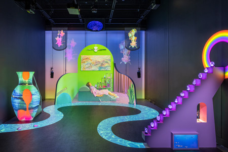 Shana Moulton. Meta/Physical Therapy. 2023–24. Eight-channel 4K and high-definition video (color, sound; 14:49 min.), MDF, vinyl, seating, scrims, props, and window gel, dimensions variable. Courtesy the artist, Galerie Crèvecœur, and Galerie Gregor Staiger. ©️ 2024 Shana Moulton. Installation view, The Museum of Modern Art, New York, February 17–April 21, 2024. Photo: Jonathan Dorado