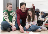 Photo: Martin Seck Image description: A family participates in a Family Gallery Talk activity