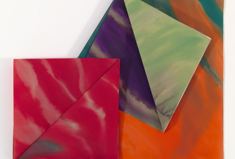 Dorothea Rockburne. Guardian Angel, II. 1982. Watercolor on vellum. The Museum of Modern Art, New York. Gift of R.L.B. Tobin. © 2024 Dorothea Rockburne/Artists Rights Society (ARS), New York Image description: A large geometric wall painting of overlapping triangles and squares, folded over one another along diagonal lines. The structural vellum shapes are painted with watery strokes of cream against deep red, dark violet bleeding into silver, and teal blooming with orange.