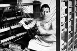 Lenore Tawney in her Coenties Slip studio, New York, 1958. The Museum of Modern Art, New York. © Lenore Tawney. Photo David Attie/Courtesy Lenore G. Tawney Foundation, New York.