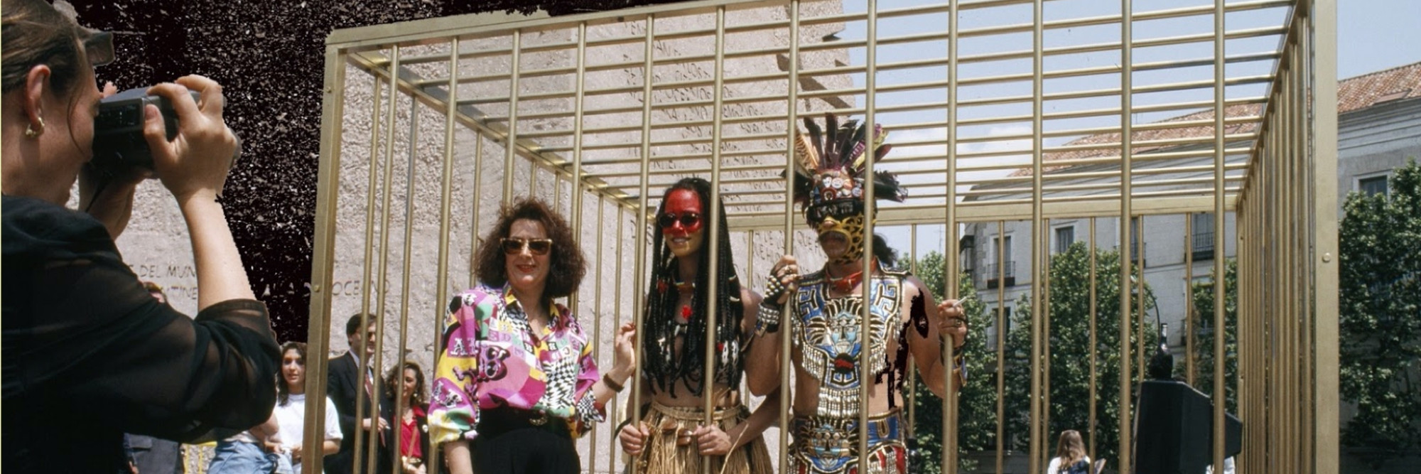 Coco Fusco, Paula Heredia. The Couple in the Cage: Guatinaui Odyssey. 1993. Standard-definition video (black and white and color, sound), 31 min. Gift of Mario Cader-Frech through the Latin American and Caribbean Fund. © 2024 Coco Fusco and Paula Heredia. Courtesy Video Data Bank, School of the Art Institute of Chicago