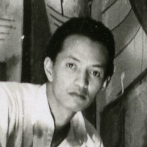 Wifredo Lam with La Jungla (The Jungle, 1942–43), Le matin vert(The Green Morning, 1943), and on the floor, La Silla (The Chair, 1943), in his Havana studio, 1943. Archives SDO Wifredo Lam, Paris.