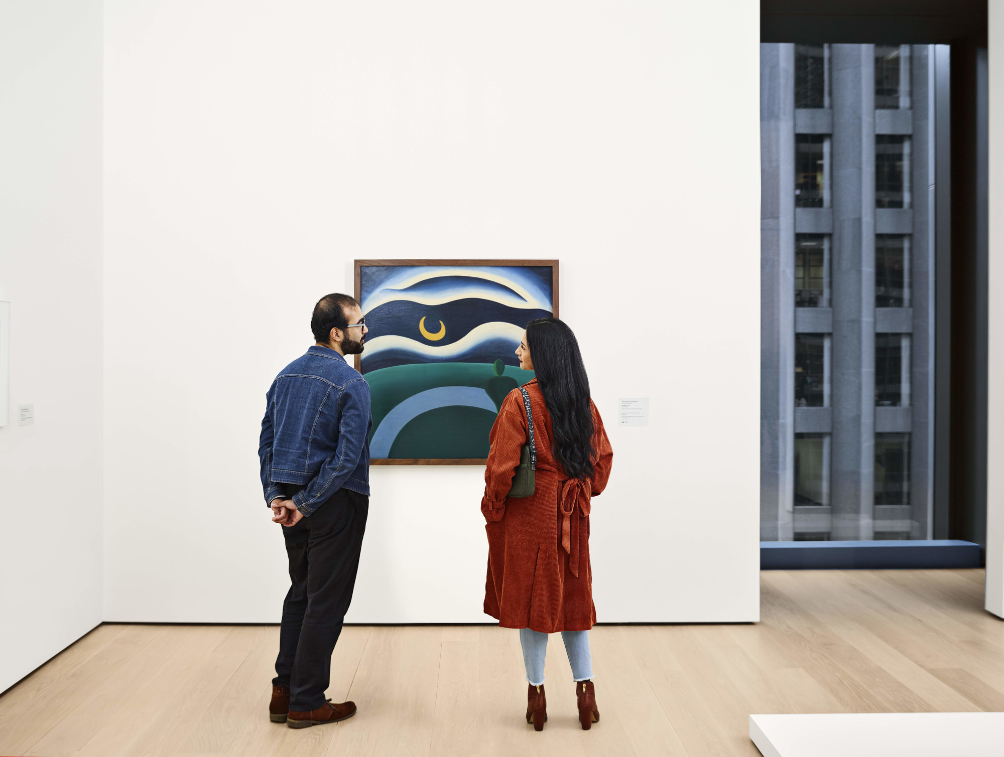 A view of the fifth-floor collection galleries. Shown: Tarsila do Amaral. The Moon (A Lua). 1928. Oil on canvas. Gift of Joan H. Tisch (by exchange). © Tarsila do Amaral Licenciamentos. Photo: Noah Kalina