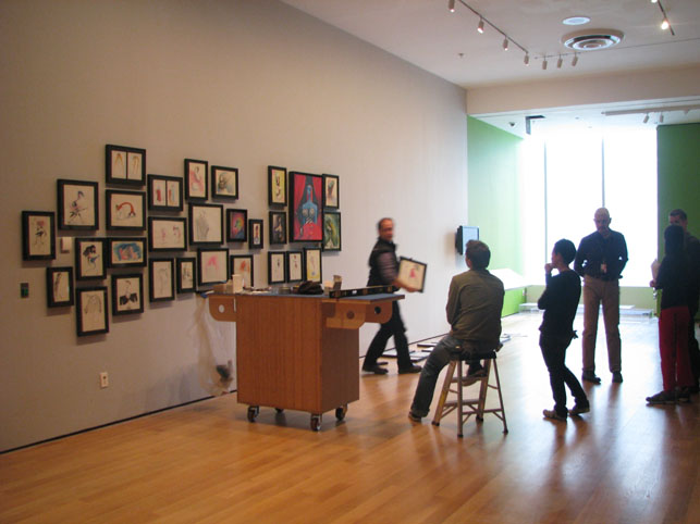 Curator Ron Magliozzi and the exhibitions team install Tim Burton