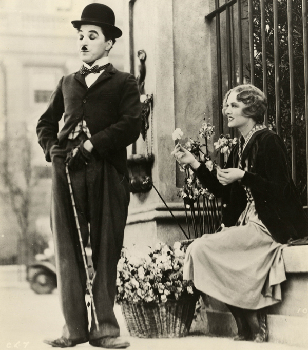 Written directed and music by Charles Chaplin