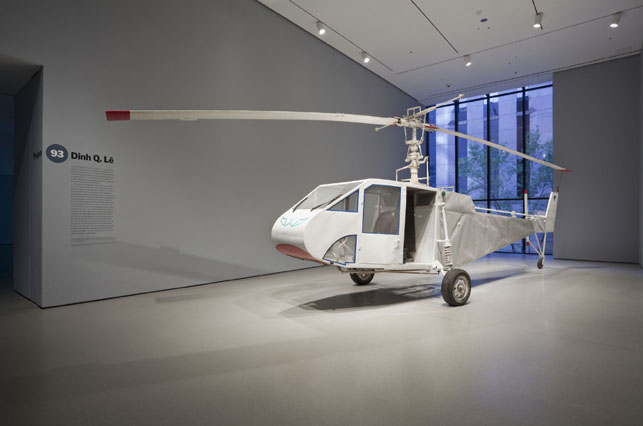 Installation view of Projects 93:Dinh Q. Lê: Dinh Q. Lê in collaboration with Tran Quoc Hai, Le Van Danh, Phu-Nam Thuc Ha, and Tuan Andrew Nguyen. Still from The Farmers and The Helicopters. 2006. Three-channel video (color, sound), 15 min., and helicopter. The Museum of Modern Art, New York. Gift of the artist, Fund for the Twenty-First Century, and Committee on Media and Performance Art Funds. © 2010 Dinh Q. Lê. Courtesy the artist; P.P.O.W. Gallery, New York; Shoshana Wayne Gallery, Santa Monica; and Elizabeth Leach Gallery. Photo: Jason Mandella