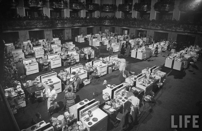 Contestants competing in the Pillsbury Bake Off baking contest in the Grand Ballroom of the Waldorf Astoria Hotel, New York. 1949. Source: Google/LIFE Photo Archive. Photograph by Lisa Larsen