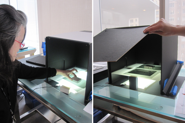 Conservator Lee Ann Daffner conducting a series of tests to evaluate the effectiveness of different layers of light filtering film