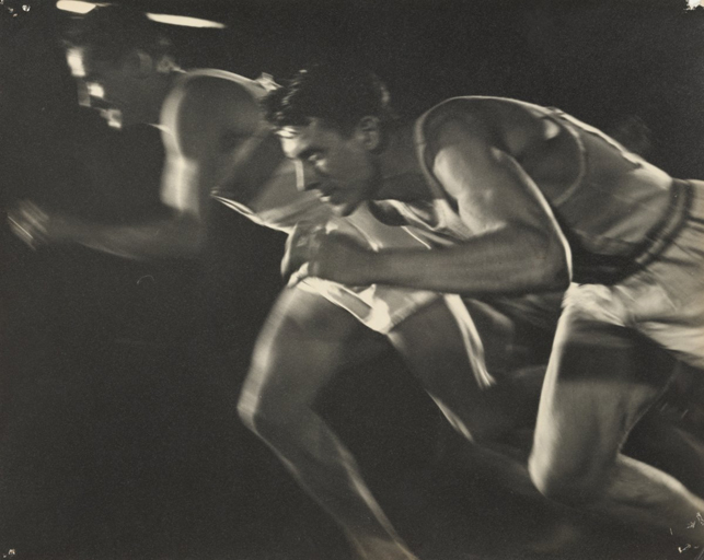 Leni Riefenstahl. Nocturnal Start of Decathlon 1,500 m Race. August 1936. Gelatin silver print. 9 5/16 x 11 3/4" (23.7 x 29.8 cm). The Museum of Modern Art, New York. Thomas Walther Collection. Purchase. © 2012 Leni Riefenstahl Estate