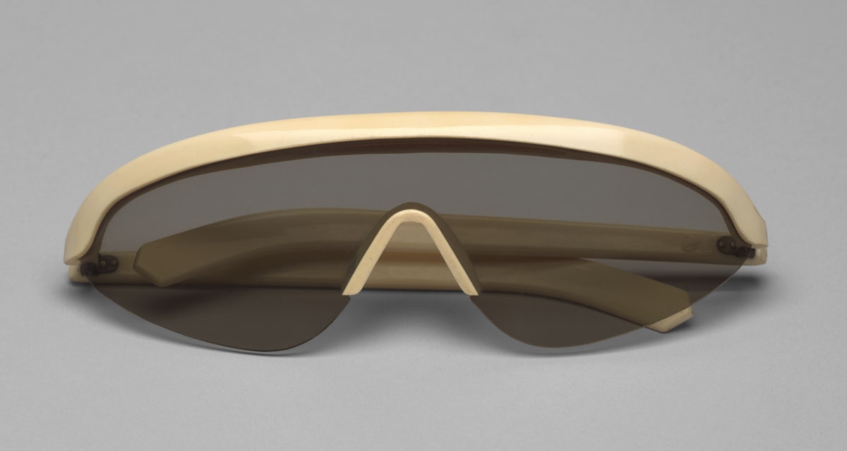 Polaroid Sunglasses. American Optical Corp., Southbridge, MA. c. 1946. Plastic, l. 6 1/8" (15.6 cm). Manufactured by American Optical Corp., Southbridge, MA. Gift of Edgar Kaufmann, Jr. Polaroid Sunglasses. American Optical Corp., Southbridge, MA. c. 1946. Plastic, l. 6 1/8" (15.6 cm). Manufactured by American Optical Corp., Southbridge, MA. Gift of Edgar Kaufmann, Jr.