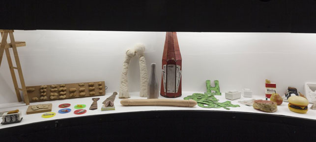 Claes Oldenburg. <i>Mouse Museum.</i> 1965–77. Wood and corrugated aluminum, plexiglas display cases with 385 objects, sound, 8' 7 9/16" x 31' 5" x 33' 7/16" (2.63 x 9.6 x 10.07 m). Installation view, The Museum of Modern Art, New York (April 14–August 5, 2013). On loan from the Austrian Ludwig Foundation, since 1991. © 1965–77 Claes Oldenburg. Photo by MoMA Imaging Services Dept. © 2013 The Museum of Modern Art