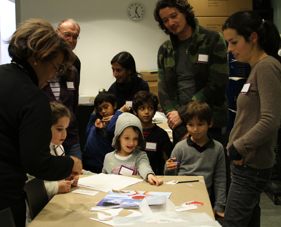 A MoMA educator demonstrating collage techniques. Photo: Johnny Tan