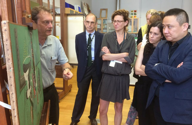 MoMA Chief Conservator Jim Coddington addresses International Curatorial Institute participants in MoMA’s paintings conservation lab