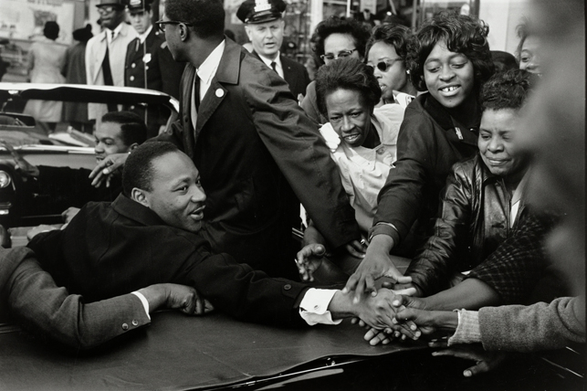 Leonard Freed. Baltimore, Maryland: Dr. Martin Luther King, Jr. being greeted upon his return to the United States after receiving the Nobel Peace Prize. October 31, 1964. Gelatin silver print, 14 1/4 x 21 3/16" (36.2 x 53.8 cm). The Museum of Modern Art, New York. Acquired through the generosity of Thomas L. Kempner, Jr. © 2015 Leonard Freed/Magnum Photos