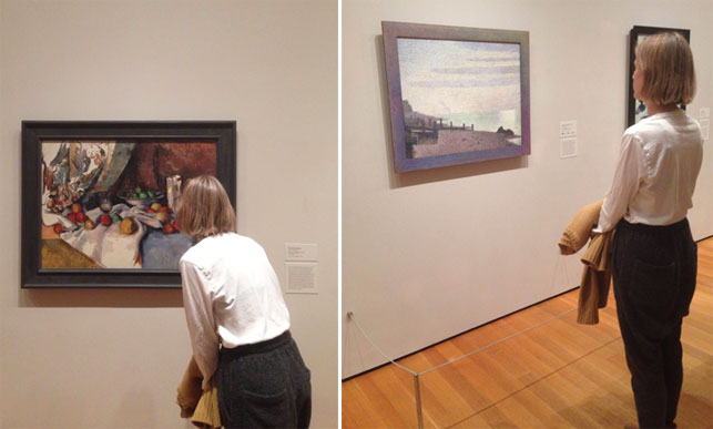 Dianna Molzan in the galleries. Shown, from left: Paul Cézanne (French, 1839–1906). Still Life with Apples. 1895–98. Oil on canvas, 27 x 36 1/2" (68.6 x 92.7 cm). Lillie P. Bliss Collection; Georges-Pierre Seurat (French, 1859–1891). Evening, Honfleur. 1886. Oil on canvas, with painted wood frame, 30 3/4 x 37" (78.3 x 94 cm) including frame. Gift of Mrs. David M. Levy