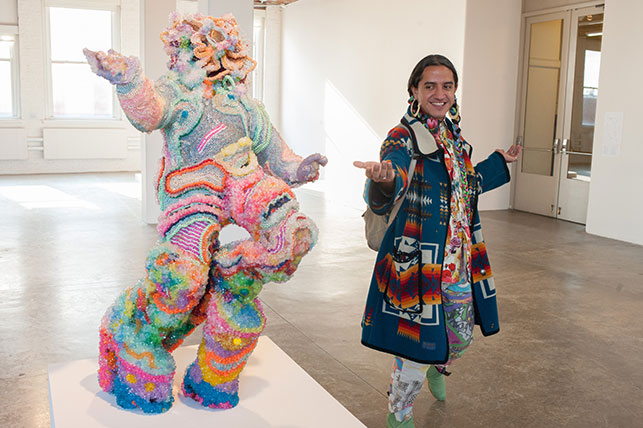 Artist Raúl de Nieves with his Day(Ves) of Wonder. 2007–14. Mixed media. © 2016 Raúl de Nieves. Installation view, Greater New York, MoMA PS1, October 11, 2015–March 7, 2016. Photo: Caleb Bryant Miller
