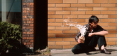 Jeff Wall. <i>Milk</i>. 1984. Silver dye bleach transparency (Cibachrome); aluminum light box, Image: 6 ft. 2 1/2 in. x 7 ft. 6 1/4 in. (189.2 x 229.2 cm), Lightbox: 6 ft. 8 1/2 in. x 8 ft. 1/2 in. x 8 3/4 in. (204.5 x 245.1 x 22.2 cm). The Museum of Modern Art, New York. Acquired through the Mary Joy Thomson Legacy. &copy; 2006 Jeff Wall
