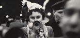 Dan Weiner. <i>New Year's Eve, Times Square</i>. 1951. Gelatin silver print, 9 1/4 x 13 3/16" (23.5 x 33.5 cm). The Museum of Modern Art. Gift of Sandra Weiner. &copy; Dan Weiner