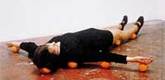 Erwin Wurm. <i>One Minute Sculpture</i>. 1997. C-print, 17 11/16 x 11 13/16" (45 x 30 cm). Courtesy the artist and Art: Concept, Paris